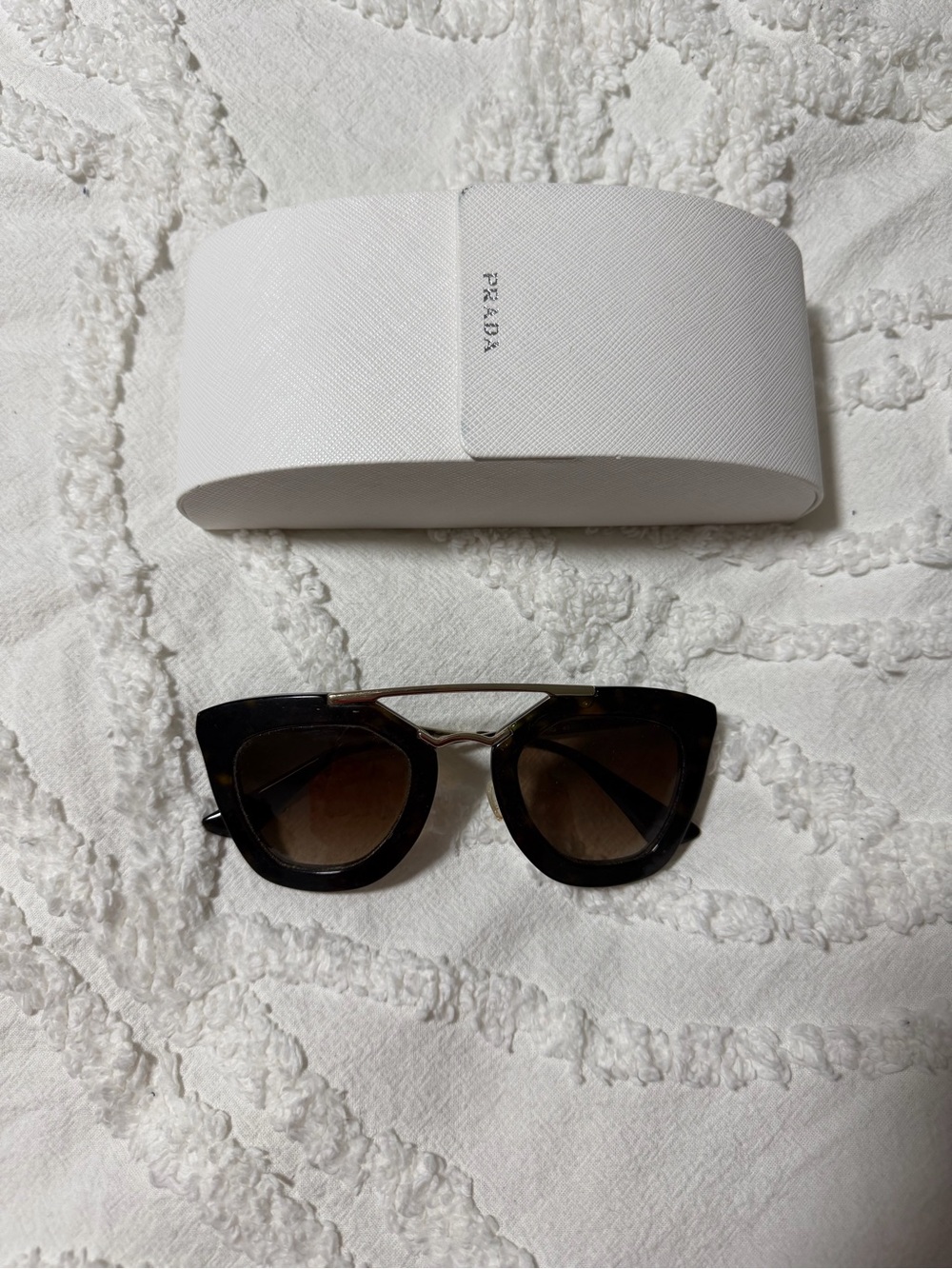 Prada Black Cat-Eye Sunglasses with Brown Gradient Lenses and Gold Bridge